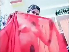 Swathi naidu showing her body and wearing red saree