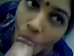 Hot aunty giving blowjob in bathroom