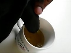 Pee in coffee mug in office