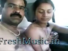 Indian couple in car - FreshMusic.in