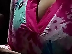 Doodhwali Indian hottie removing dress and black bra revealing hot boobs squeezing out milk and Fingering hot hairy pussy
